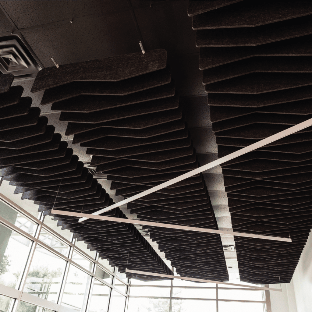 Loftwall Tempo acoustic ceiling grid baffles installed in the lobby of an office
