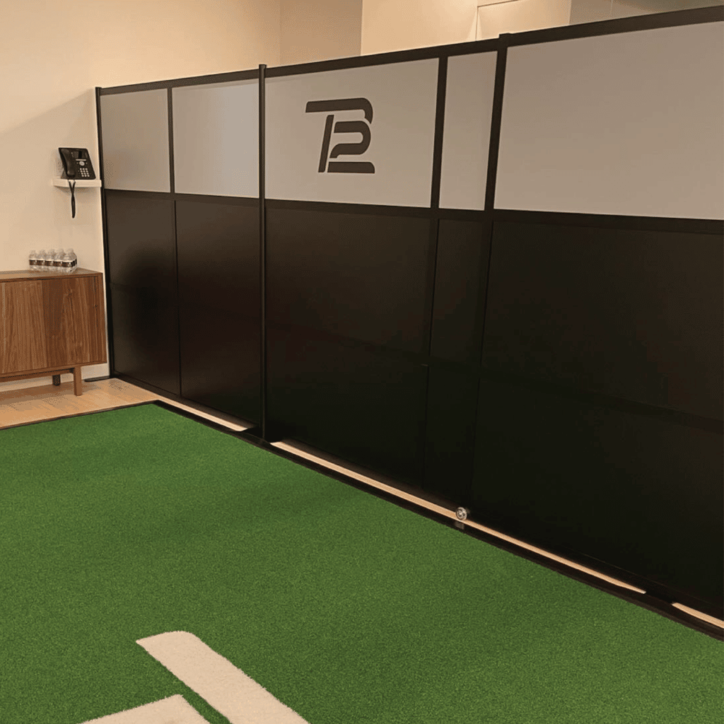 Loftwall room dividers Framewall linked together with rolling door and custom branded panels wall mounted to separate a gym