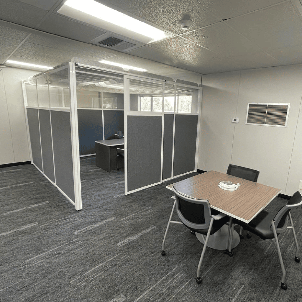 Loftwall Rooms with ceiling baffles installed in the corner of a modern office